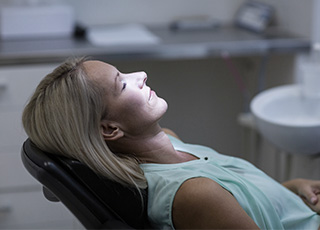 Relaxed woman in dental chair
